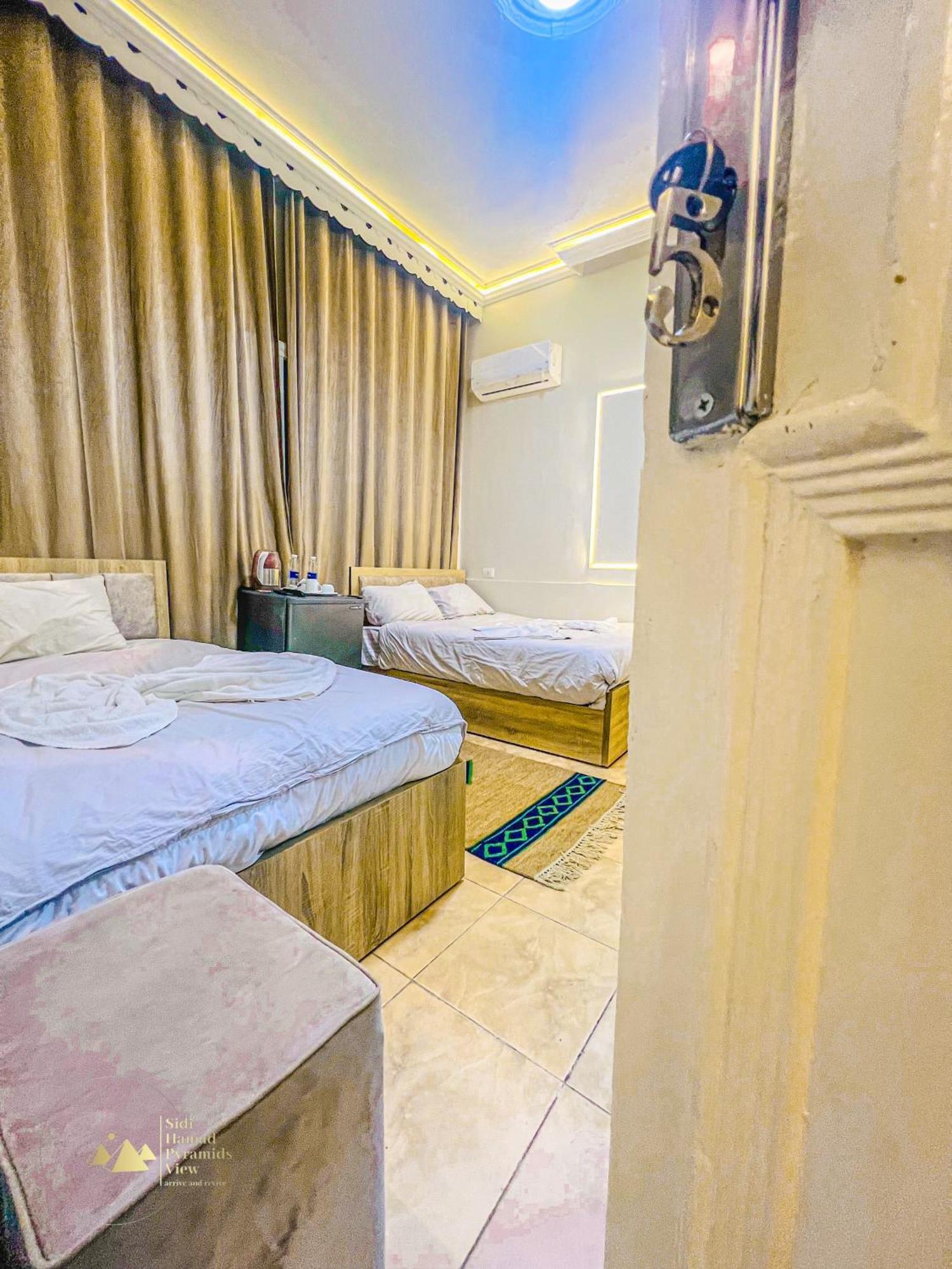 Sidi Hamad Pyramids View Hotel Kafrat al Jabal Exterior photo